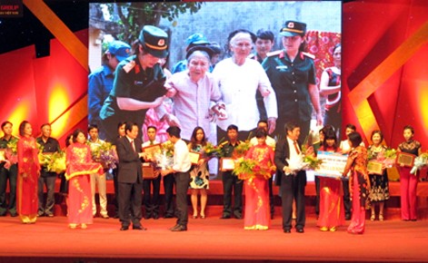 Activities mark 66th anniversary of War Invalids and Martyrs’ Day - ảnh 1